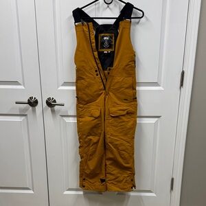 Picture Ninge kids Snow Bib Overalls Gold color.